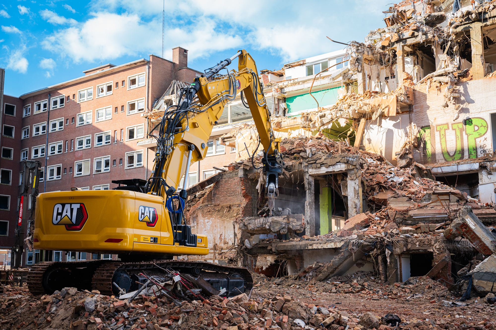 Heitmann & Fils a adopté en première mondiale la nouvelle pelle Cat® 330 UHD avec Bergerat Monnoyeur